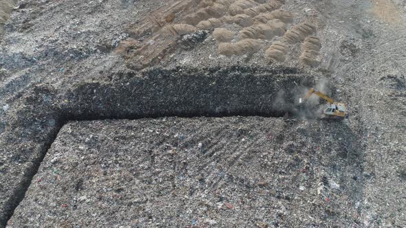 Methane Extraction Aerial View of the Waste Storage Escalator Digs a Trench View From a Height on