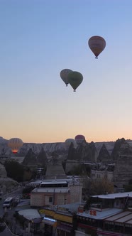 Vertical Video of Hot Air Balloons Flying in the Sky Over Cappadocia Turkey