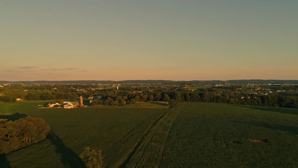 Aerial View of Amish Farms and Fields During the Golden Hour on a Late Summer Afternoon