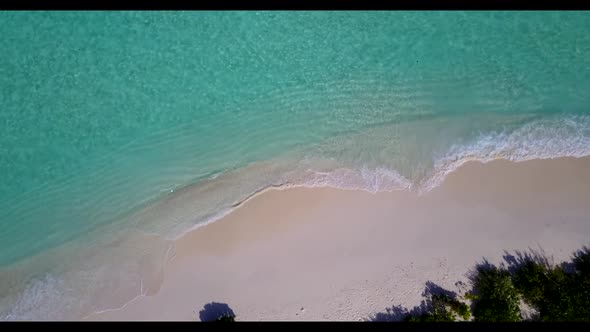 Aerial top view travel of beautiful island beach trip by blue ocean with bright sandy background of 