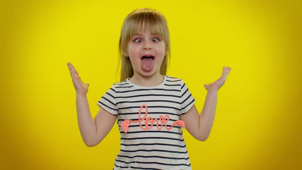 Funny Child Kid Girl Making Playful Silly Facial Expressions and Grimacing Fooling Showing Tongue