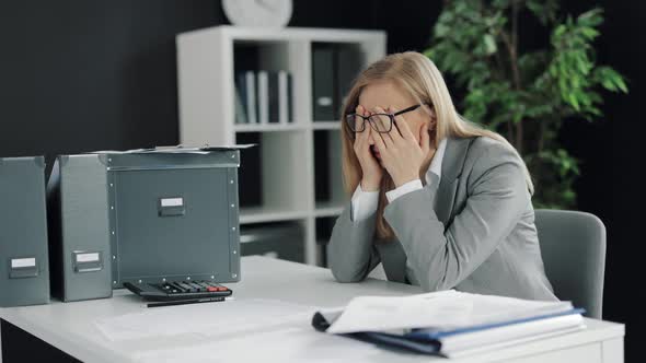 Desperate Business Woman at Office