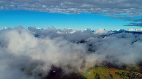 Fog morning at downtown district. Above the clouds.