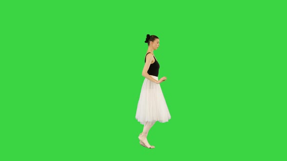 Young Ballerina Runs Slowly Making Arms Movements on a Green Screen Chroma Key