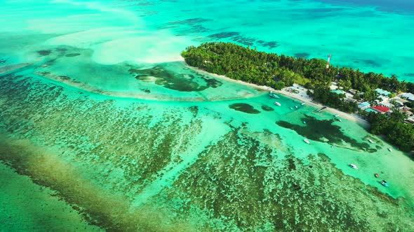 Tropical overhead copy space shot of a sandy white paradise beach and blue sea background in high re