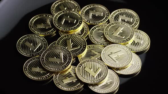 Rotating shot of Bitcoins (digital cryptocurrency) - BITCOIN LITECOIN 237