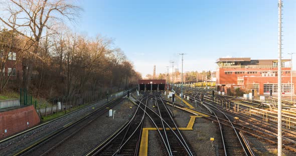 Time lapse of train yard, repair and cleaning depot of public transport underground line in 4k