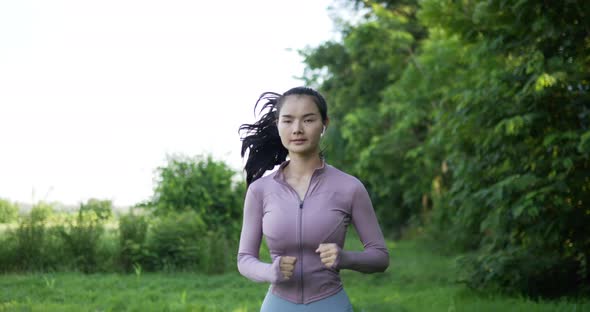 Asian young woman running