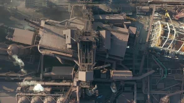 Aerial View Over Industrialized City with Air Atmosphere and River Water Pollution From