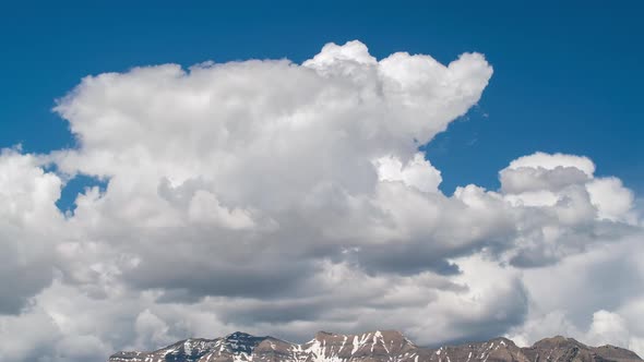 Clouds moving over the top of Timpanogos Mountain