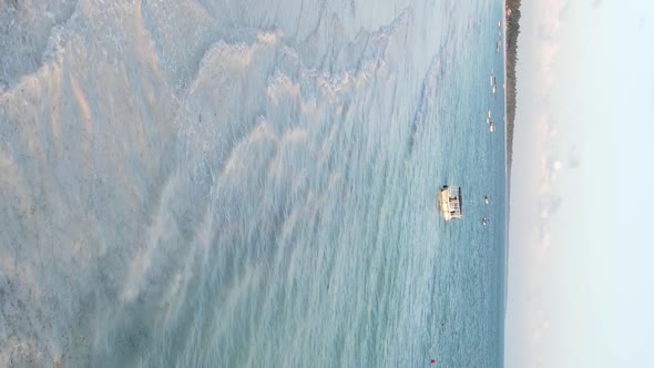 Vertical Video of the Beach on Zanzibar Island Tanzania Aerial View