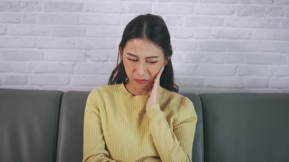 Woman Suffering From Toothache