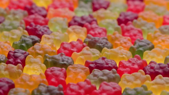 Full Frame Looped Spinning Background of Colorful Jelly Bear Candies