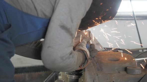 Welding Process. Workman Works, Worker Works In The Auto Workshop