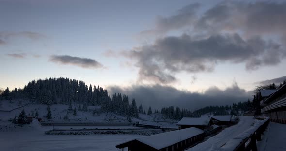 Short Time Lapse Mountains Snow Sunset Clouds Village Slope - Fundata, Romania