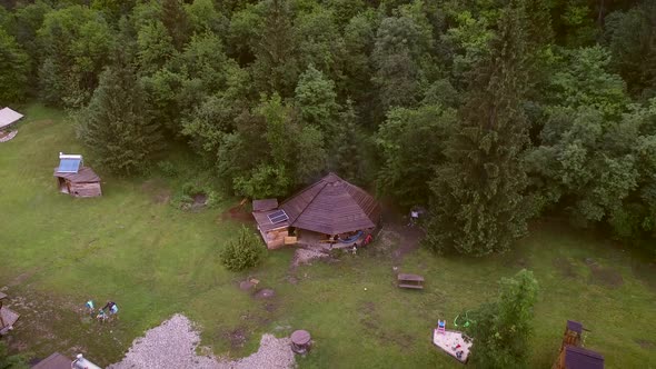 Aerial view of an excursion camp surrounded by nature in Soca river, Slovenia.