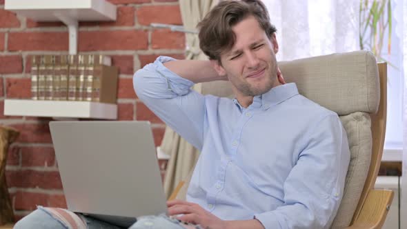 Tired Young Man Having Neck Pain