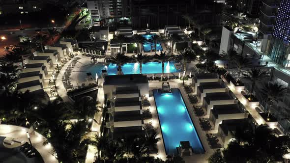 Swimming pools at night shot with drone 