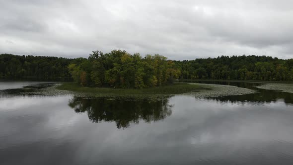 lake up north in minnesota aerial view during a cloudy day