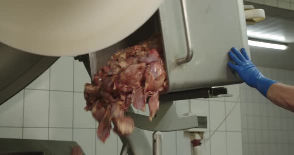 In A Large Meat Grinder Grind The Meat With Chicken. Production Of Sausages