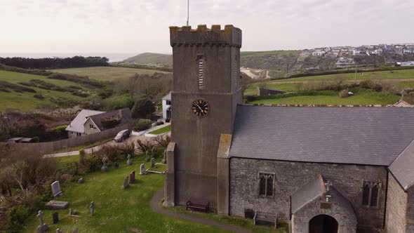 Aerial Crantock Village Church revealing Crantock Beach in Cornwall