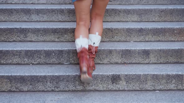 Lady Tourist Goes Up Stairs Into Medieval Building Portico