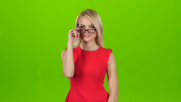 Pretty Blonde Winks Her Eyes Off Glasses, Green Screen Studio