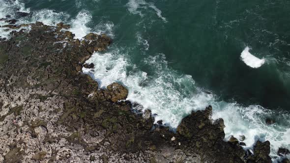 Aerial View of Sea Waves and Fantastic Cliffs Rocky Coast