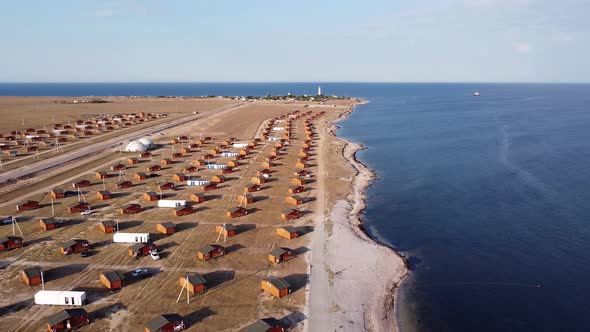 Camping Area Near the Black Sea Coast with a Bunch of Small Wooden Houses for Tourists Shooting From