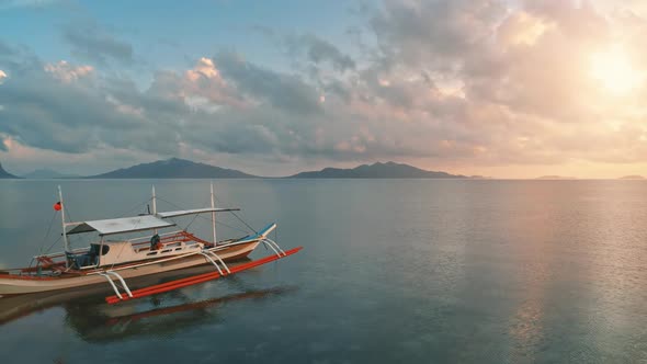 Philippines Wooden Boat in Colorful Paradise Sunset