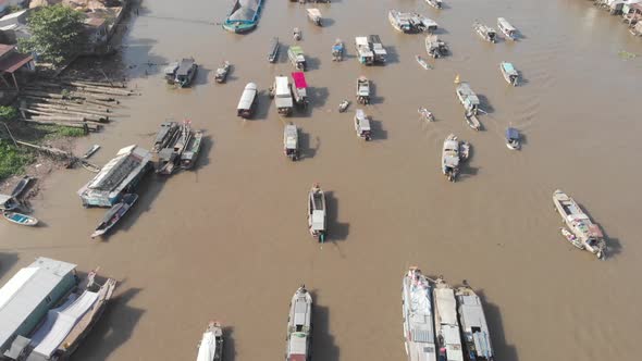 Aerial: rotating panorama over Cai Rang floating market Can Tho Vietnam