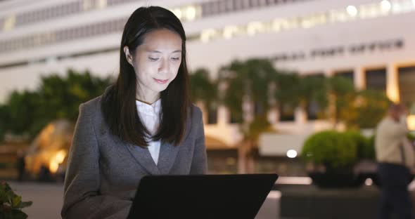 Asian business woman work on notebook computer