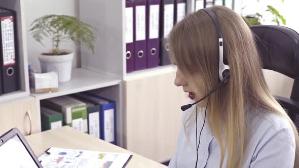 Call Center Agent Speaking with Customer