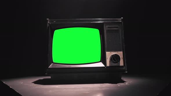 Vintage Tv Television Green Screen. Zooming Into Green Screen of an Old Television Vintage Style 