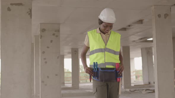 Female Construction Worker Posing on Site