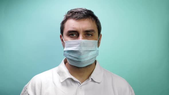 Man Take Off Protective Medical Mask