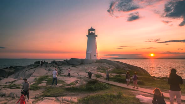 Sunset over Peggy's Cove Lighthouse Atlantic Coast Nova Scotia Canada (7 secs)