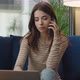 Attractive Young Woman is Speaking on Smartphone Having Unpleasant Conversation - VideoHive Item for Sale
