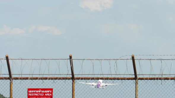 Wide Body Airliner Climbing After Take-off