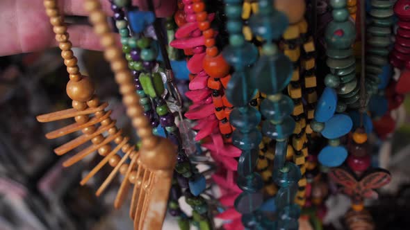 A Lot of Beads in Different Colors Are Selling on the Outdoor Fair