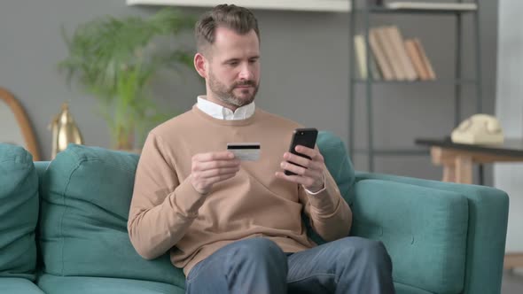 Man Unsuccessful Online Payment on Smartphone