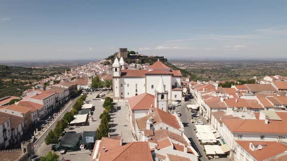 Aerial backwards view from church to complete city in a panoramic effect. Castelo de Vide. Portugal