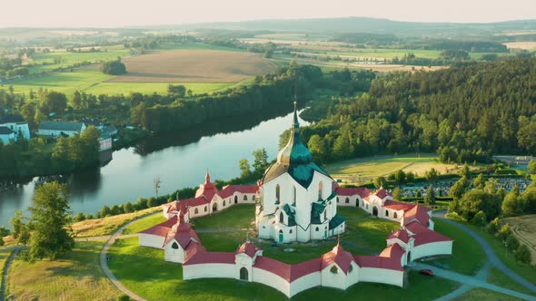 Flying Above the Pilgrimage Church of Saint John of Nepomuk on the Green Hill at Sunset