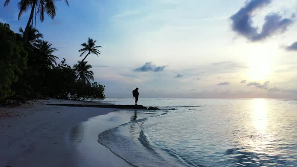 Tourist happy and smiling on paradise sea view beach journey by shallow sea and white sandy backgrou