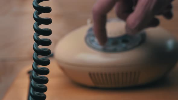 Dialing a Number on an Old Vintage Wire Telephone Pick Up the Phone and Call