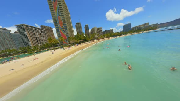 Soaring Over the Pacific Ocean Towards Waikiki Beach, FPV Drone Flying Fast Over Waikiki with Honolu