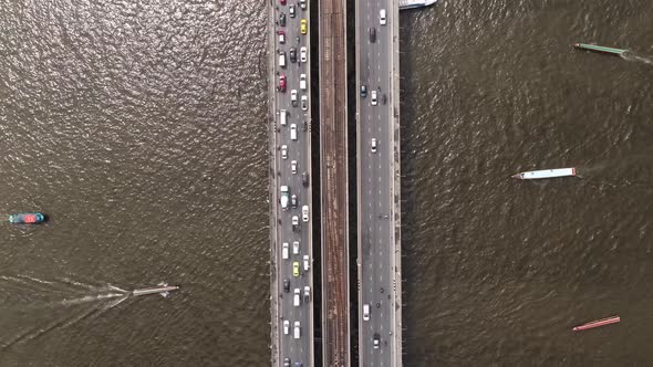 4k Time lapse, Top view of the Chao Phraya River, Traffic of cars and boats.
