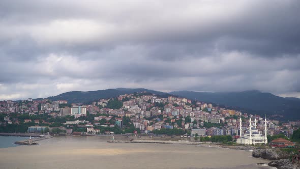 Muddy Sea and City in Rainy Weather Time Lapse 4K