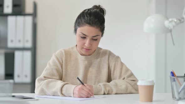 Indian Woman Writing on Paper 