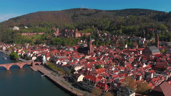 Pedestrian bridge over the river. Beautiful top view of the Heidelberg castle.